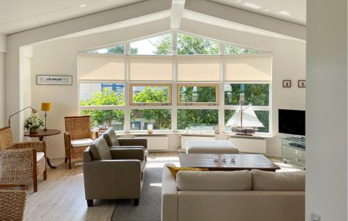 a large living room with a large window at Sanbank 3 in Workum