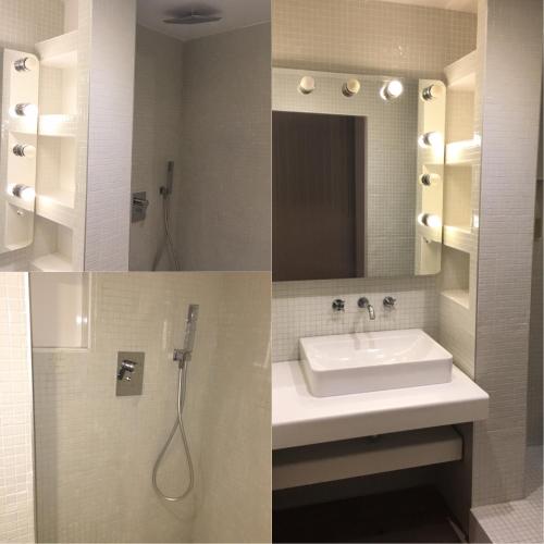 une salle de bain avec un lavabo et un miroir dans l'établissement Appartement mini loft 54m2- 200m STADE VELODROME-trés proche PALAIS DES SPORTS et PLAGES du Prado, à Marseille