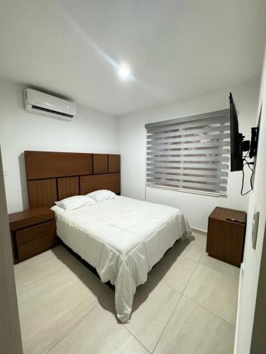 Postel nebo postele na pokoji v ubytování Almarena Paradise