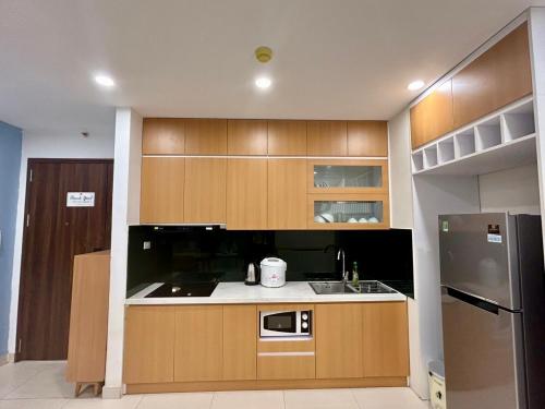 Kuchyň nebo kuchyňský kout v ubytování Serviced apart FLC Green -7 min Kengnam , 1 min My Dinh Bus station
