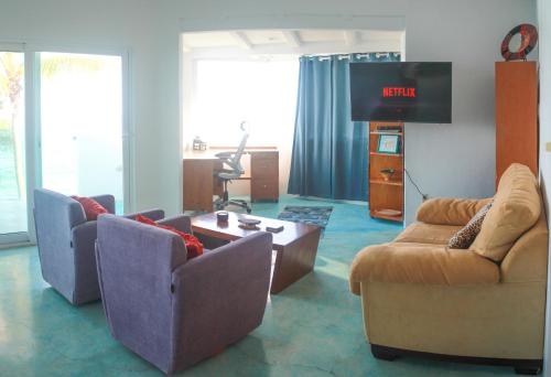 Casa Lamanaiにあるテレビまたはエンターテインメントセンター