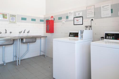 a bathroom with two counters and a sink at Echo Holiday Parks - Port Pirie in Port Pirie