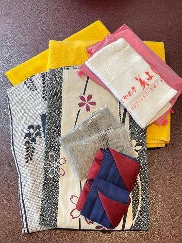 a group of napkins sitting on top of a table at Ryokan Miyoshi in Nagoya