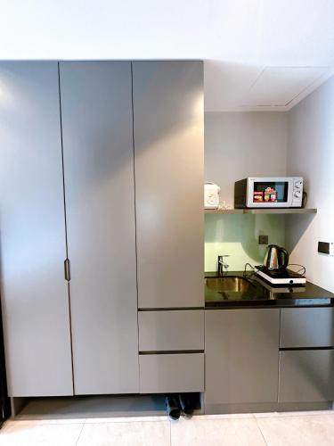 Kuchyň nebo kuchyňský kout v ubytování Sun Residence