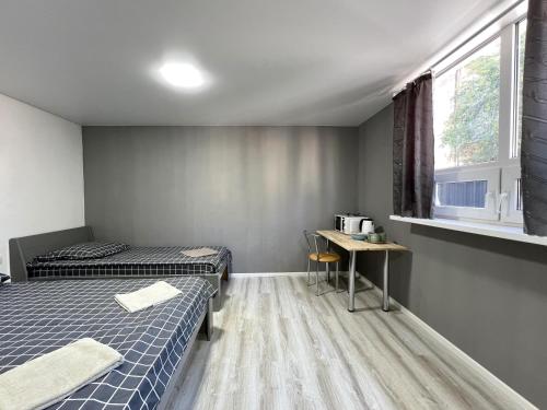 Ένα ή περισσότερα κρεβάτια σε δωμάτιο στο Apartments in Center