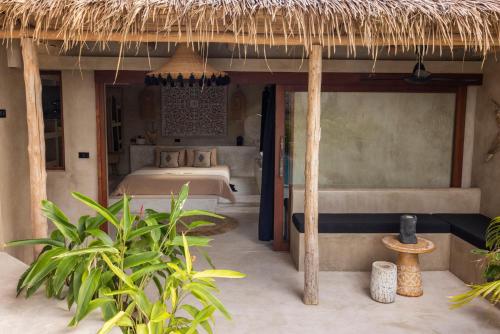 a bedroom in a resort with a bed at Karma Resort in Bophut 