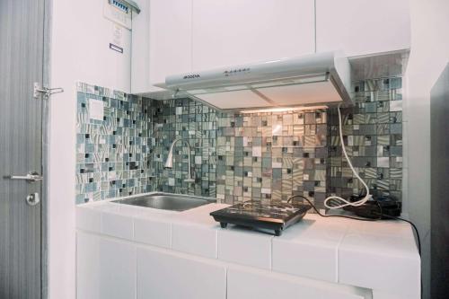 Φωτογραφία από το άλμπουμ του Simply Look Studio at Amazana Serpong Apartment By Travelio σε Τάνγκερανγκ