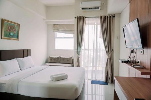 Postel nebo postele na pokoji v ubytování Restful and Enjoy Living Studio Parkland Avenue Apartment By Travelio