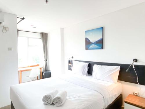Postel nebo postele na pokoji v ubytování Comfort Stay Studio at Enviro Apartment By Travelio
