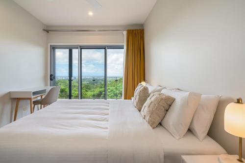 Katil atau katil-katil dalam bilik di Buderim Mountain Panorama Retreat