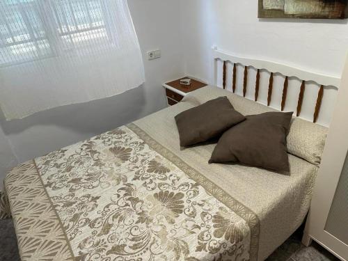 Postel nebo postele na pokoji v ubytování Apartment near beach and town center