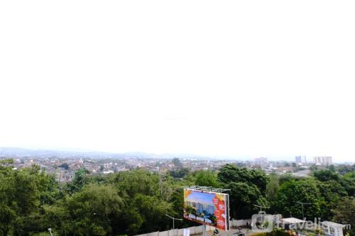 a view of a city from the top of a building at Spacious 3BR at Gateway Pasteur Apartment By Travelio in Bandung