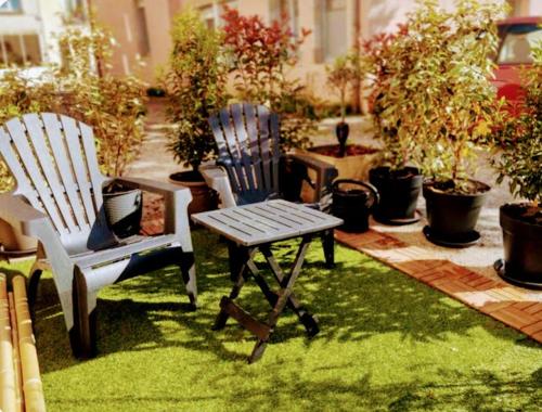 Giardino di Maison de village appartement RDC avec terrasse