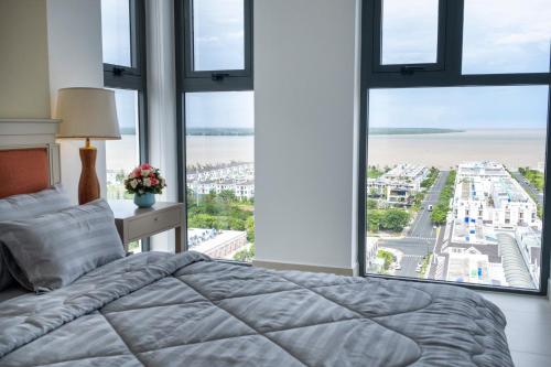 Postel nebo postele na pokoji v ubytování Sophia Apartment - Sophia Center Phu Cuong