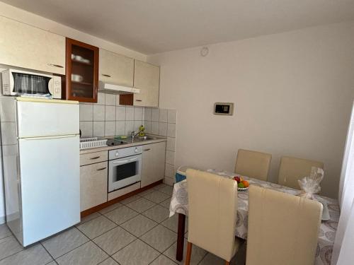 Fotografie z fotogalerie ubytování APARTMANI REŠETAR v destinaci Privlaka