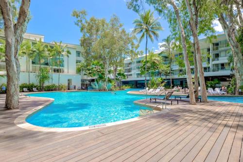 an image of a swimming pool at a resort at Belle Escapes Drift Beachfront Resort Suite 3402 in Palm Cove