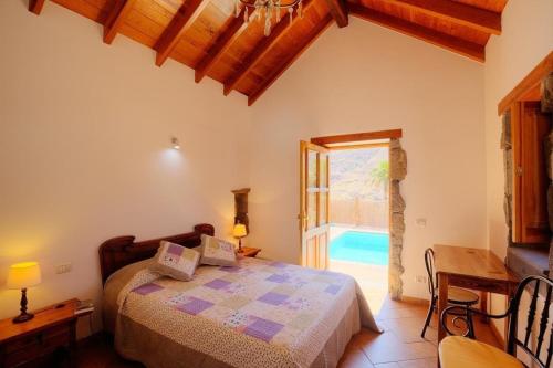 Posteľ alebo postele v izbe v ubytovaní Komfortables Ferienhaus mit privatem Pool und idealer Lage im Naturpark mit Nähe zum Strand
