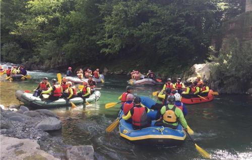 a group of people are rafting down a river at Gorgeous Home In Sant'angelo Romano in SantʼAngelo Romano