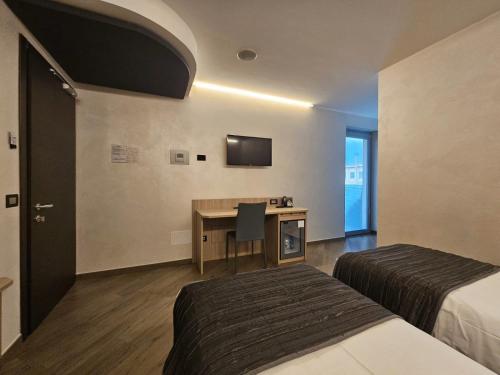 TV a/nebo společenská místnost v ubytování Mito Hotel