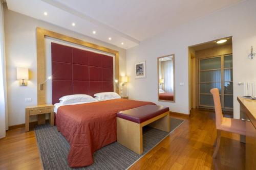 Postel nebo postele na pokoji v ubytování Hotel delle Rose Terme & WellnesSpa