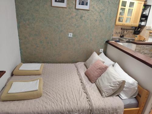 Ένα ή περισσότερα κρεβάτια σε δωμάτιο στο Studio apartman Tisno-Smokva