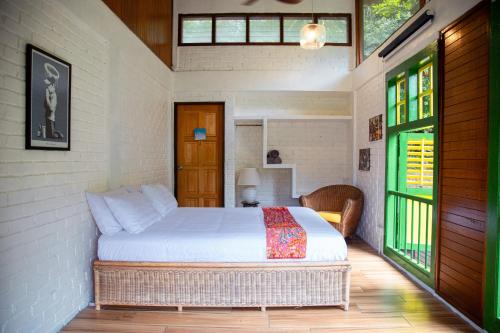 a bedroom with a bed in a room at The Dusun in Seremban