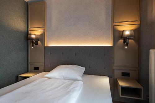 Cama o camas de una habitación en Karoli Hotel Waldkirchen
