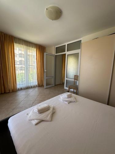 Postel nebo postele na pokoji v ubytování PSB Apartments in Midia Resort Aheloy