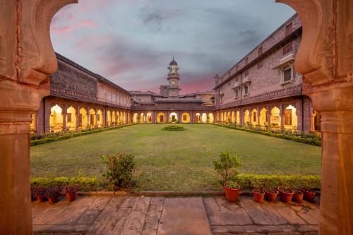 an open courtyard of a building with a large yard at Umed Bhawan Palace, Kotah in Kota