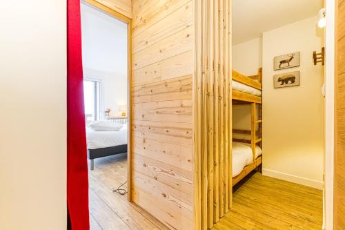 En eller flere senge i et værelse på Homency - Résidence de l'Alpe 29