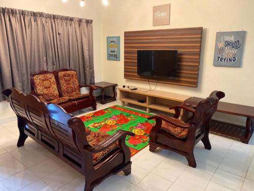 Televisyen dan/atau pusat hiburan di Highlands Double Story House