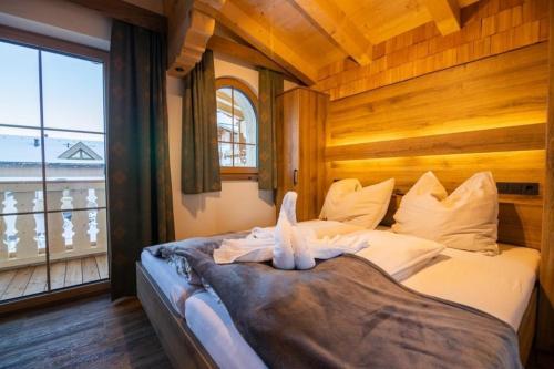 Postel nebo postele na pokoji v ubytování Falkensteinalm Top 3