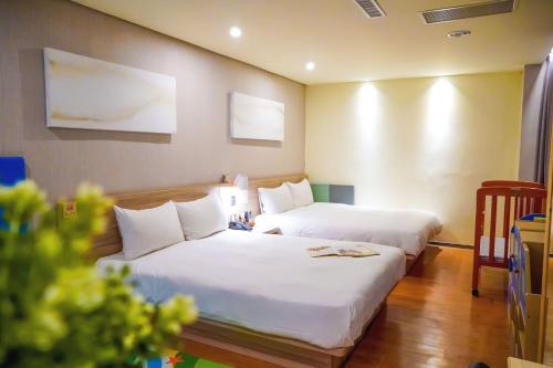 Postel nebo postele na pokoji v ubytování Smile 73 Hotel