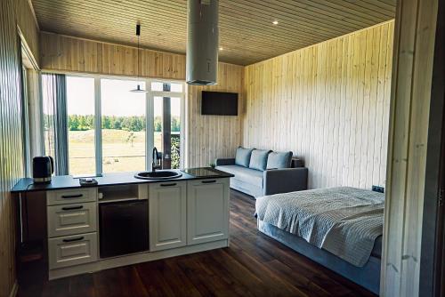 Un pat sau paturi într-o cameră la Five Pine Resort