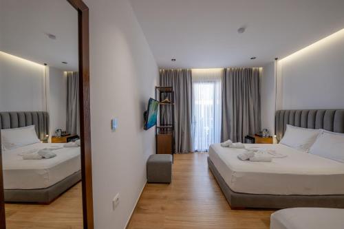 Postel nebo postele na pokoji v ubytování Hotel Siars