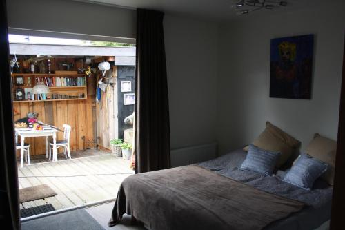 Postel nebo postele na pokoji v ubytování Bed & Breakfast Klokgaaf