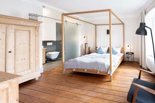 Katil atau katil-katil dalam bilik di FREYZEIT Apartments Deidesheim