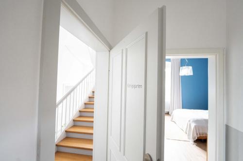 Katil atau katil-katil dalam bilik di FREYZEIT Apartments Deidesheim
