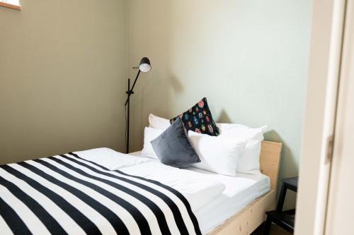 Katil atau katil-katil dalam bilik di FREYZEIT Apartments Deidesheim