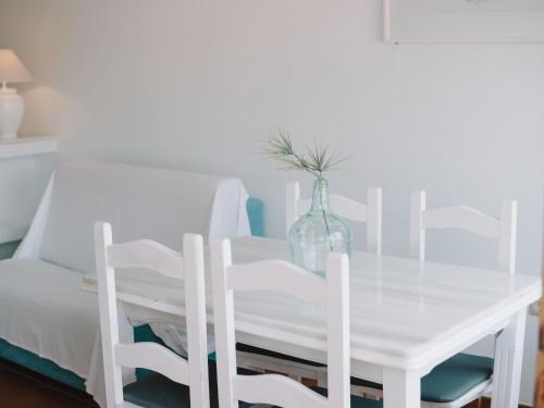 Ένα ή περισσότερα κρεβάτια σε δωμάτιο στο Hostal del Cabo