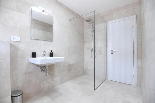 Koupelna v ubytování Bibinje Apartments