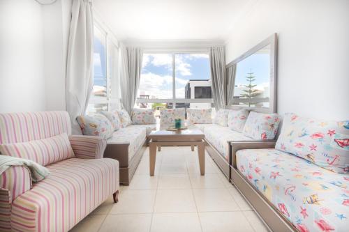 Appartement paisible en bord de merにあるシーティングエリア