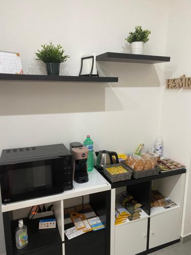 Kuchyň nebo kuchyňský kout v ubytování Residenza Via Verdi