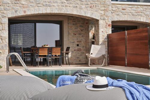 The swimming pool at or close to Beachfront Alassa Villas w Private Pools Complex