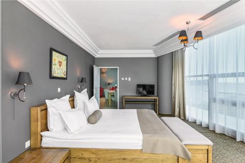 Кровать или кровати в номере Vega Hotel