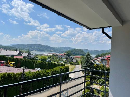 a view from the balcony of a house at Pokoje Gościnne nad Rożnowskim in Gródek Nad Dunajcem