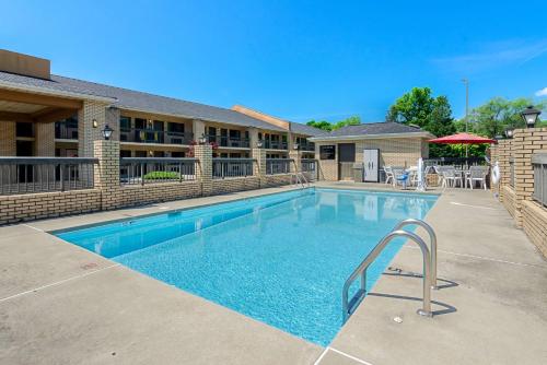 a swimming pool in front of a hotel at Quality Inn Salem - I-81 in Salem
