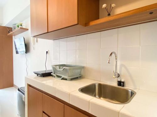 Kuchyň nebo kuchyňský kout v ubytování Best Choice Studio Apartment Tokyo Riverside PIK 2 By Travelio