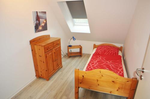 Ένα ή περισσότερα κρεβάτια σε δωμάτιο στο Ferienhaus Zur Alten Maar, 65332