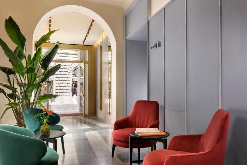 Χώρος καθιστικού στο Floren Hotel